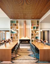 The Living Library is anchored by a copper fireplace.