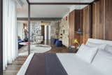 Bedroom, Bed, Pendant Lighting, and Dark Hardwood Floor  Photos from A New Hotel That Celebrates Ibiza's Maritime History and Love For Parties