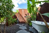 Outdoor, Walkways, and Shower  Outdoor Walkways Shower Photos from A Renovated Hawaiian Beach House From the 1950s Asks $1.79M