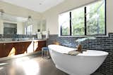 Bath, Freestanding, Soaking, Recessed, Drop In, Wall, and Ceramic Tile  Bath Wall Recessed Soaking Photos from A Silver Lake Home Built in 1939 Is Renovated From Top to Bottom