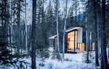 Located on the Blaeberry River near Golden, British Columbia, this glass cabin was designed by Form and Forest.