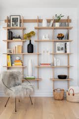 Veal and Stucker created a stylish and functional reading nook off of the living room, complete with a custom shelving unit. 