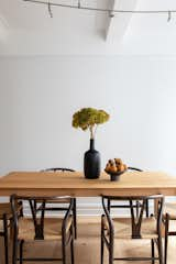 Organic shapes and natural materials create a dining vignette that is simple yet stylish.  