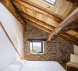 New windows and skylights were added for natural light and ventilation, opening up the bedrooms to the surrounding mountain views.&nbsp;