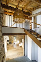 The top-floor loft was originally used to store food, but has been converted to bedrooms.&nbsp;