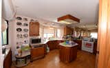 Before: The outdated kitchen was awkwardly designed, lacking both functionality and storage.