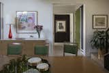 A Serigraph by New Orleans artist Ida Kohlmeyer hangs over the  Paul McCobb Credenza; John Derian green lacquer tray.