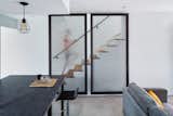Staircase, Wood Tread, and Metal Railing Stair Guard custom fabricated by Davey McEathron Architecture  Photo 4 of 15 in Chelsea ADU by Davey McEathron Architecture