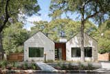 Front Elevation - The simplicity of the front elevation graphically describes the programmatic layout of the house - splitting the house into public and private zones. 