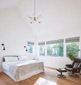 Master Bedroom - A grand vaulted ceiling and private creek views characterize the master suite.
