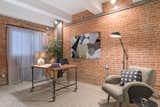 Private study with brick walls and industrial accents  Photo 4 of 6 in Chelsea Loft by Anne Ruthmann Photography