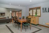 The space transitions smoothly from entertaining in the formal dining area...