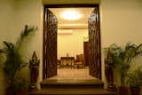Entrance door having brass flowers and heavy wooden hand craving  Search “creme+mains+hand+cream是什么意思中文【精仿++微wxmpscp】” from SURAJ - BUNGALOW