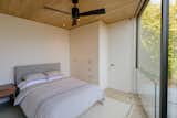 Bedroom, Light Hardwood Floor, Recessed Lighting, Bed, and Rug Floor  Photos from Amagansett Landmark