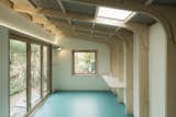 The blue vinyl floor makes the space unique