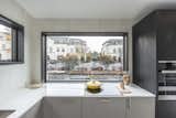 Kitchen, Marble Counter, Cooktops, Wall Oven, Wood Cabinet, and Undermount Sink Atlanta Design Economy Credits

Architecture: Jeffrey Bruce Baker
Hard surface and cladding material manufacturer: Neolith  Photo 3 of 10 in 6 Marble Alternatives For Your Kitchen Worktops from Neolith Tiny House