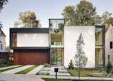 Exterior, Metal Roof Material, House Building Type, Wood Siding Material, and Flat RoofLine  Photo 3 of 4 in Cantilever House by Atlanta Design Festival