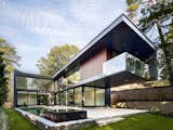 Exterior, Wood Siding Material, House Building Type, Flat RoofLine, and Metal Roof Material  Photo 1 of 4 in Cantilever House by Atlanta Design Festival