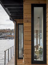 Exterior, Small Home Building Type, Flat RoofLine, Wood Siding Material, and House Building Type Exterior with cedar siding and large windows  Photos from Lake Union Floating Home