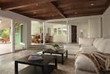 Previously separated now living and dining areas of the house.