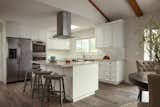 Opened kitchen now connects to a breakfast room.