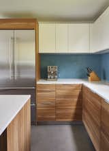 Kitchen, Engineered Quartz Counter, Refrigerator, Mosaic Tile Backsplashe, and Wood Cabinet  Photos from Issaquah Highlands Residence