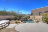 "Spool"--heated pool/spa combo with seating area