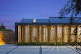 Louvered Entry Wall | Light Filter