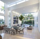 Dining Room, Limestone Floor, Table, and Chair  Photo 7 of 18 in 77 Bal Harbour by Sdh Studio Architecture + Design