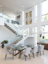 Dining Room, Table, Limestone Floor, Ceiling Lighting, and Chair  Photo 8 of 18 in 77 Bal Harbour by Sdh Studio Architecture + Design