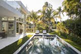 Outdoor, Large Patio, Porch, Deck, Back Yard, Trees, Grass, Gardens, Large Pools, Tubs, Shower, Landscape Lighting, and Shrubs  Photo 17 of 18 in 77 Bal Harbour by Sdh Studio Architecture + Design