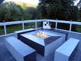 Put some spark in your outdoor fireplace with Susan Jablon 5/8" Black Iridescent Glass tiles (Sku# 7807408). http://ow.ly/vzVm30iR7mm #tile #glasstile #mosaictile #customtile #outdoorliving #fireplacepic #outdoorfireplace #deckremodel #summertime #backdeck #decor #deckdesign #deck