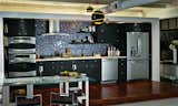 Imagine waking up and making your weekend breakfast in this gorgeous kitchen! Susan Jablon can make your dreams a reality. This tile is suitable for both indoor and outdoor installation and can be altered to increase or decrease any colors you like!
Love this look? Shop our Black Iridescent Round Mix here: https://www.susanjablon.com/penny-round-black-iridescent-glass-tile.html #tile #roundtile #customtile #mosaictile #mosaicglasstile #susanjablon #glasstile #customkitchen #customdesign #iridescenttile #kitcheninspo #kitchenpics #kitchenremodel #interiordesign #homedecor #homestyle #newkitchen #kitchenrenovation #colorfulkitchen #colorfultile #kitchendesign #homerenovation #diningroompics #decor