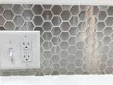 Top trends for backsplashes right now include Metallic finishes and Hexagonal shapes, so what better than to feature Susan Jablon's 1 1/4" Stainless Steel Hexagon Tiles in your kitchen? 
For the ultimate WOW factor, install the backsplash up to the ceiling to make it even bolder. It will not just be a protective surface; it will be a piece of art.
https://www.susanjablon.com/catalogsearch/result/?q=hexagon
#kitchen #kitcheninspo #kitchendesign #kitchenremodel #kitcheninspiration #backsplash #backsplashideas #style #interior #intastyle #instahome #instagood #interior123 #interior4all #interiorinspo #interiordecor #interiordesign #home #homedecor #homeinspo #homeideas #homedesign #renovate #remodel #tile #tiles #mosaictile #customtile #metallictile #hexagonaltile #geometrictile #kitchenpics #susanjablon #beautifulhome #homebeautiful #homestyle #kitchendesign #modernkitchen #kitchenbacksplash #decor #kitchendecor #newkitchen #kitchenrenovation #brightkitchen #kitchenart #designerkitchen #uniquekitchen #metallickitchen #sparklykitchen #wallart