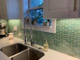 Kitchen, Concrete Backsplashe, Wood Backsplashe, Subway Tile Backsplashe, Mosaic Tile Backsplashe, Marble Backsplashe, Stone Tile Backsplashe, Mirror Backsplashe, Glass Tile Backsplashe, and Metal Backsplashe Mint Green Iridescent Glass Tiles are ethereal and alluring, particularly with how they capture and reflect light  Photo 3 of 3 in North Carolina Kitchen Remodel by Susan Jablon