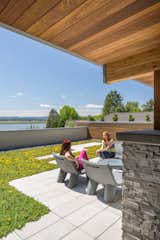 The courtyard to the view  Photo 5 of 10 in Evergreen Pointe House by Steelhead Architecture