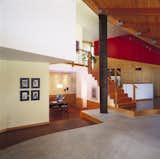 Living Room, Pendant Lighting, Concrete Floor, Ceiling Lighting, and Medium Hardwood Floor  Photo 2 of 3 in Island Residence by Kevan Hoertdoerfer Architects