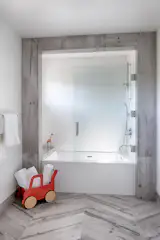 The kids’ bathroom was reconfigured and made more functional.