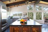 A soothing color palette is achieved by mixing modern and natural materials.