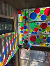 applied cut vinyl dots  Photo 13 of 15 in Prince Road Container House by Rob DePiazza