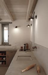 Kitchen, Concrete Counter, Concrete Backsplashe, Wall Lighting, Cooktops, and Undermount Sink Kitchen  Chris Alfstad’s Saves from ROCKSPLIT house