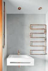 In the WC. Custome made towel heater  Photo 1 of 22 in The Marina Apartment by COMETA ARCHITECTS