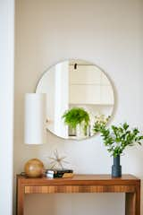 Clean-lined walnut credenza folds out into a petite desk