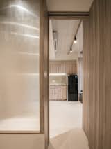 Glazing partition helps bring more light to existing bathroom