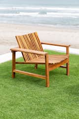 The Verbena Patio Armchair in beautiful Teak hardwood. Don't let the hardwood fool you, this chair is actually very comfortable. And like all our outdoor collection, this chair will age beautifully with time and exposure. 
The modern yet simple design makes this chair a timeless you'll enjoy for decades. 