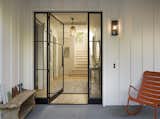 White Cabinet, Metal, Exterior, Wood Tread, Metal Railing, Side-by-Side, Swing Door Type, and Doors  Photo 11 of 24 in Menlo Oaks 3 Residence by Ana Williamson Architect