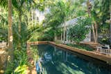 Separated by a swimming pool allows the clients' guest to feel as though they have their own private tropical lagoon.