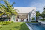 Outdoor, Back Yard, Side Yard, Hardscapes, Trees, Shrubs, Grass, Walkways, Standard Construction, Small, Landscape, Plunge, and Concrete  Outdoor Side Yard Plunge Landscape Small Photos from Tropical Minimal