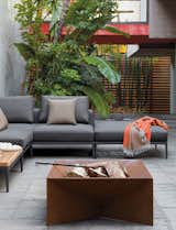 Outdoor, Concrete Patio, Porch, Deck, Pavers Patio, Porch, Deck, Back Yard, and Hardscapes  Photos from Gather Around These 7 Modern Fire Pit Designs