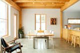 Dining Room, Track Lighting, Table, Concrete Floor, Stools, Bar, and Chair  Photos from GO Home Takes the Passive House Approach to Prefab